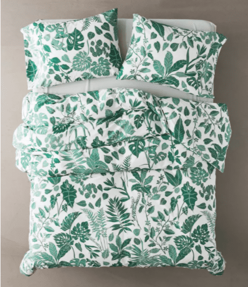 bed duvet with green leaves