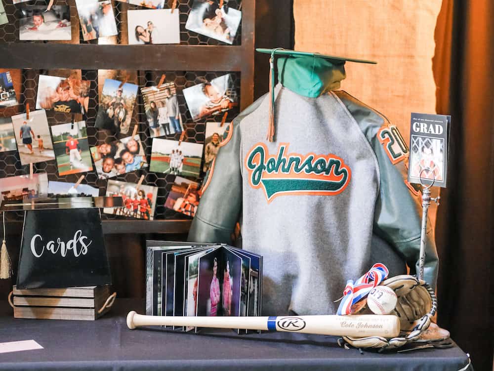 graduation party display table with sports memorabilia 