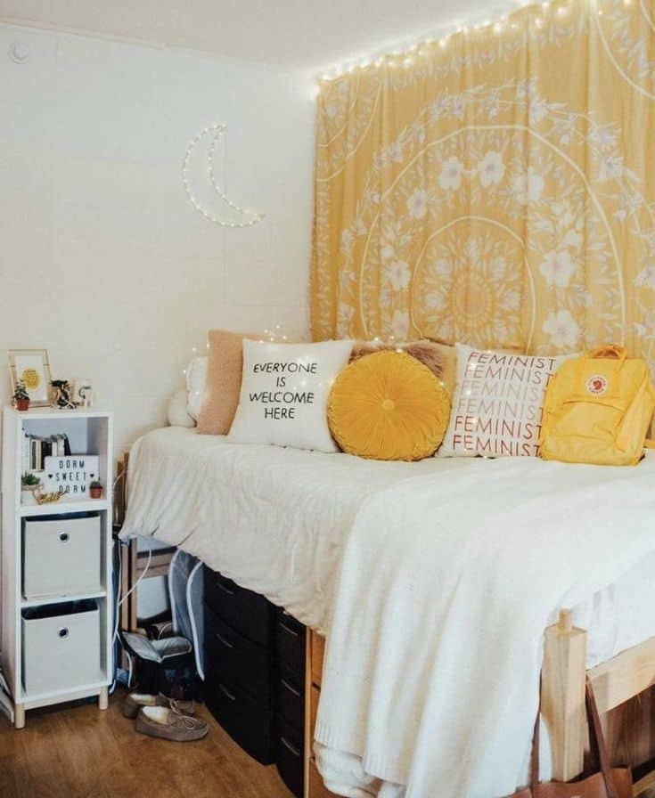 boho dorm room with yellow tapestry