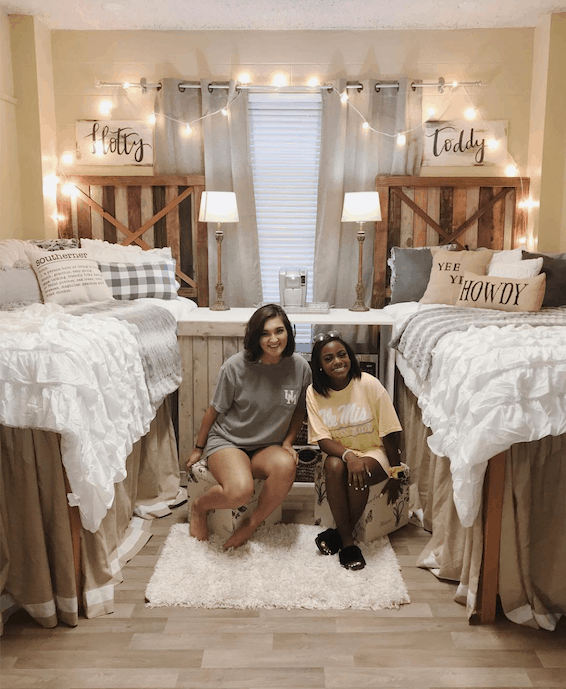 two girl roommates in rustic themed dorm room