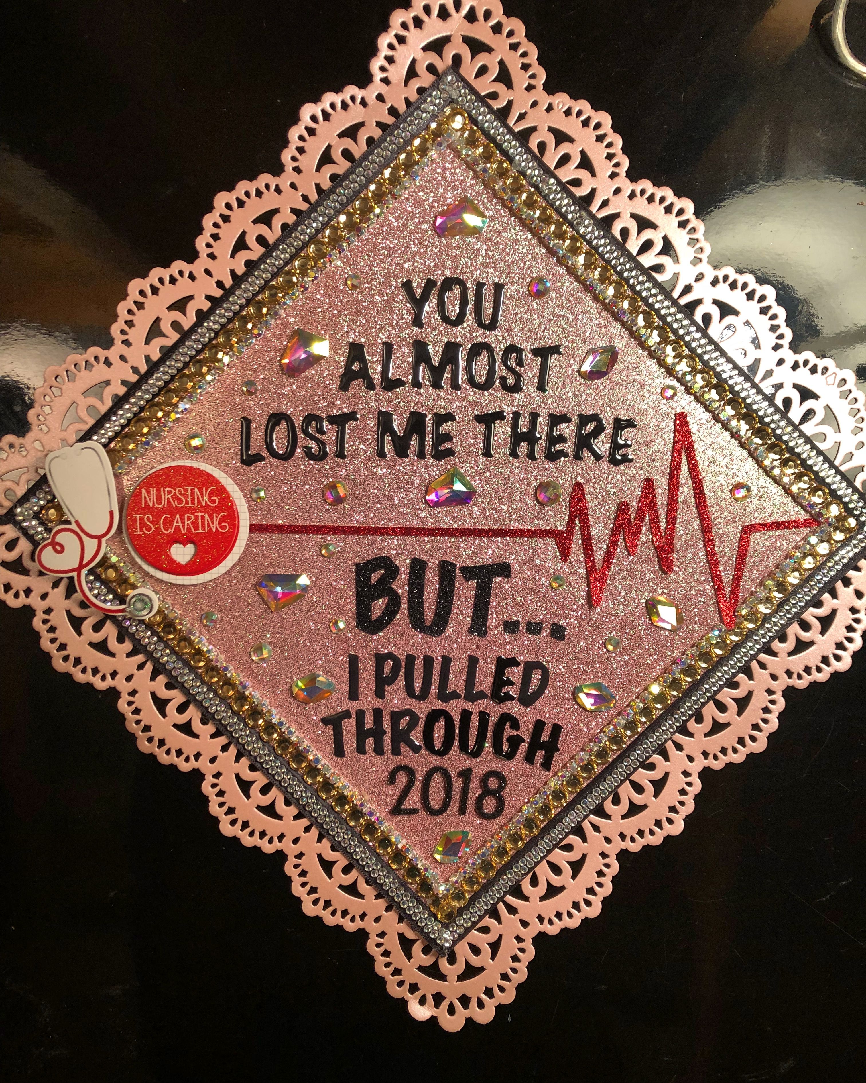 pink sparkly graduation cap that says you almost lost me there but I pulled through