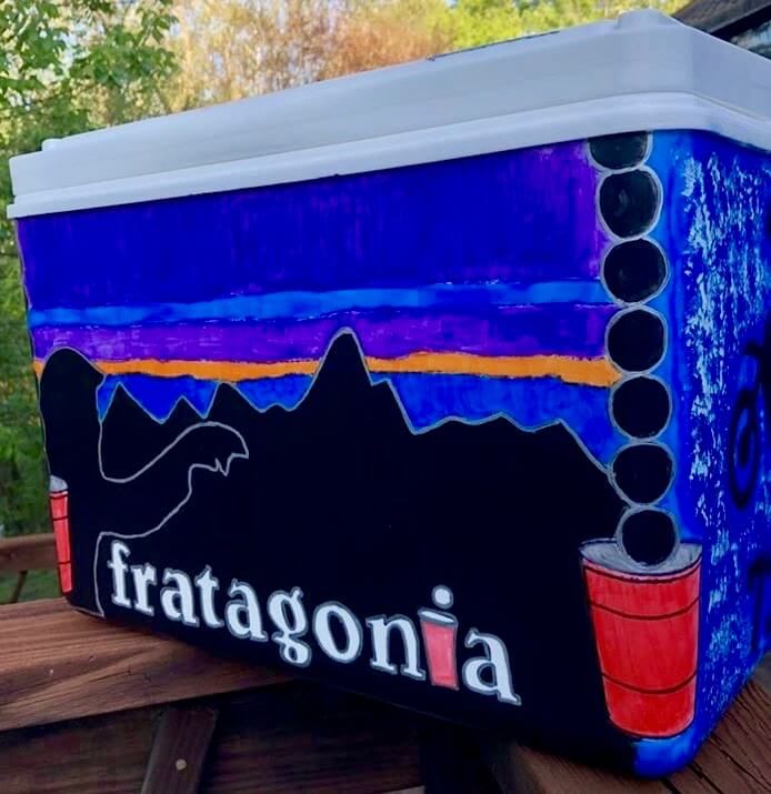 painted cooler with mountains and the word fratagonia