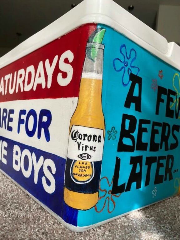 fraternity cooler with beer bottle painted on it