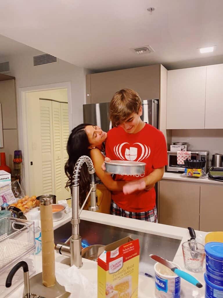 teen couple baking