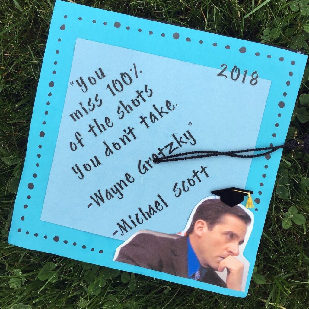 Blue graduation cap topper with the words you miss 100% of the shots you don't take wayne gretzky michael scott