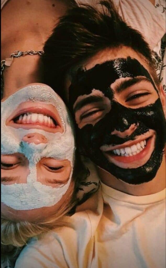 teen couple with face masks on