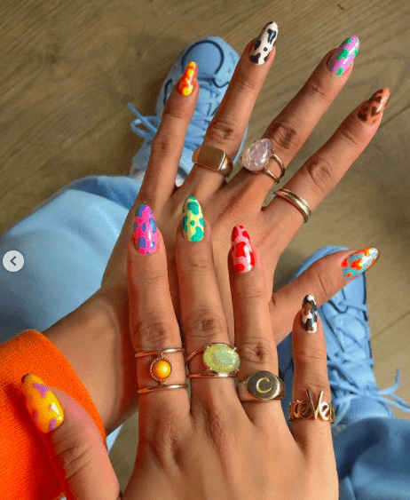 colorful cow print nail polish design