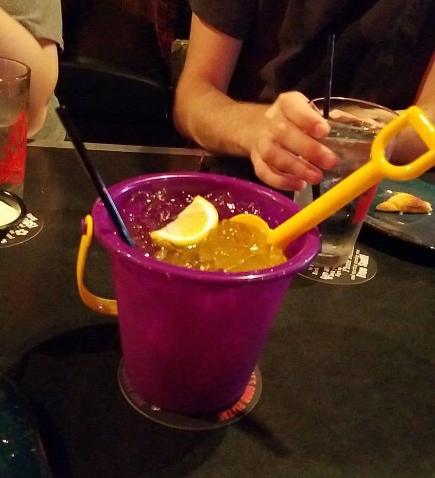 plastic bucket filled with drink