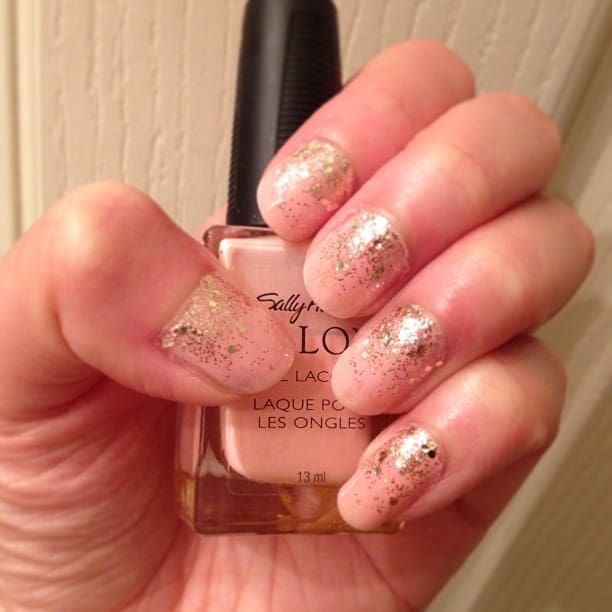 pink nails with gold sparkles
