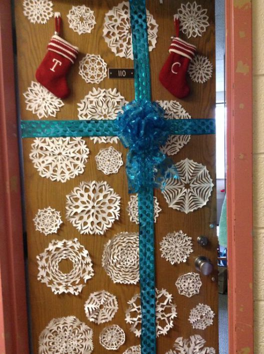 dorm door decorated with paper snowflakes