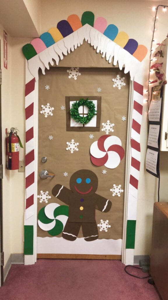 dorm door decorated like gingerbread house