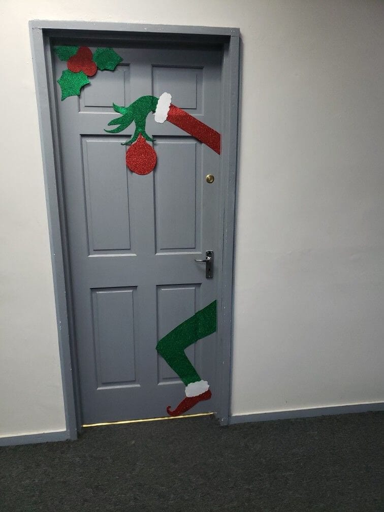 door with grinch cutout