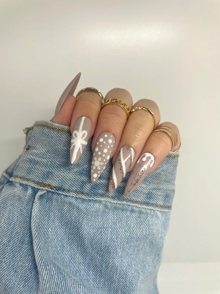 white and taupe nails with various designs