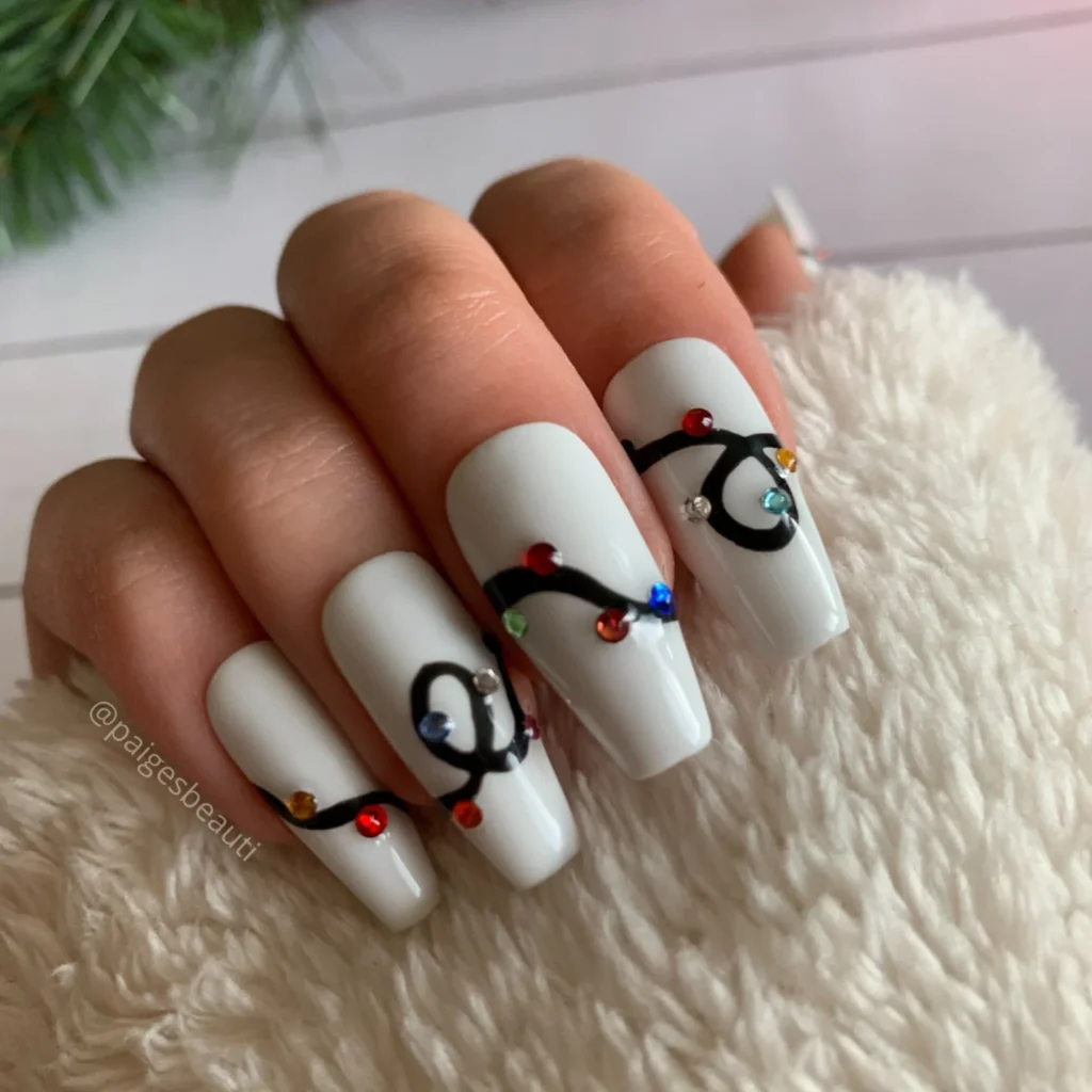 white nails with christmas lights design