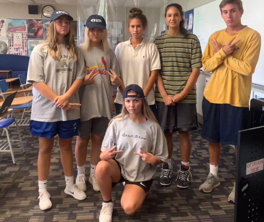 students dressed up as Adam Sandler